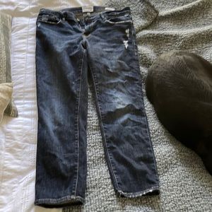 Slight distress blue jeans